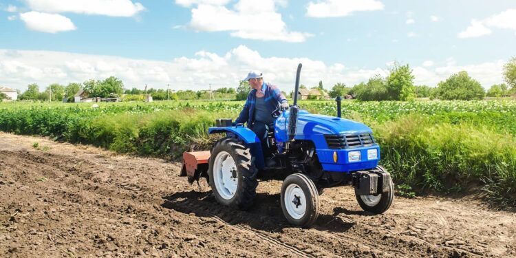 farmer on a tractor 2021 10 27 18 12 48 utc